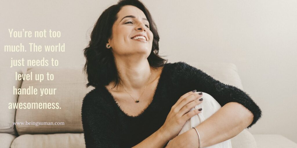 a woman smiling confidently while relaxing on a couch, paired with an empowering message